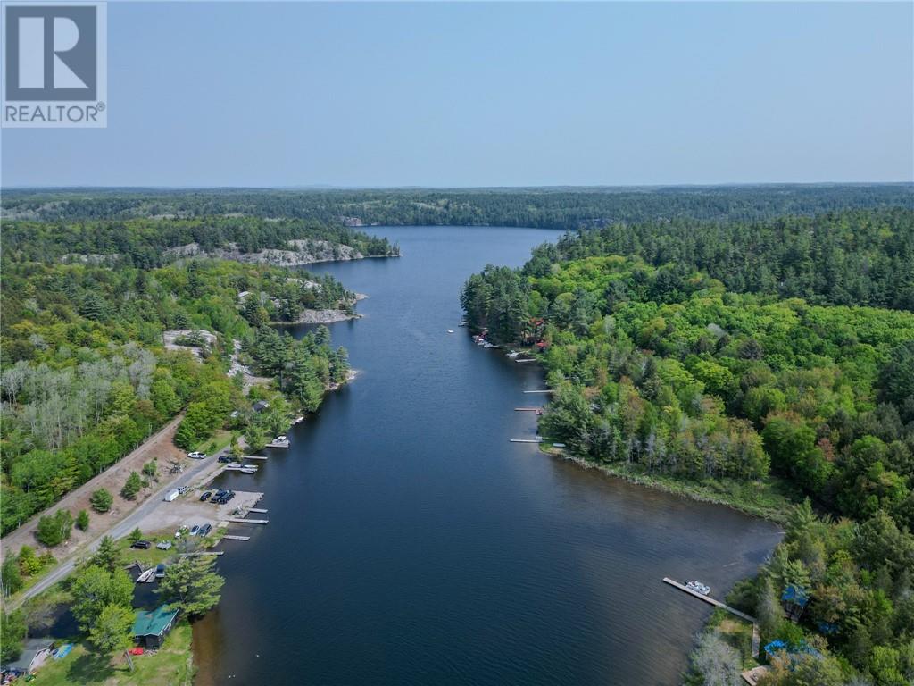 Natural shoreline and open water at Charlton Lake Camp